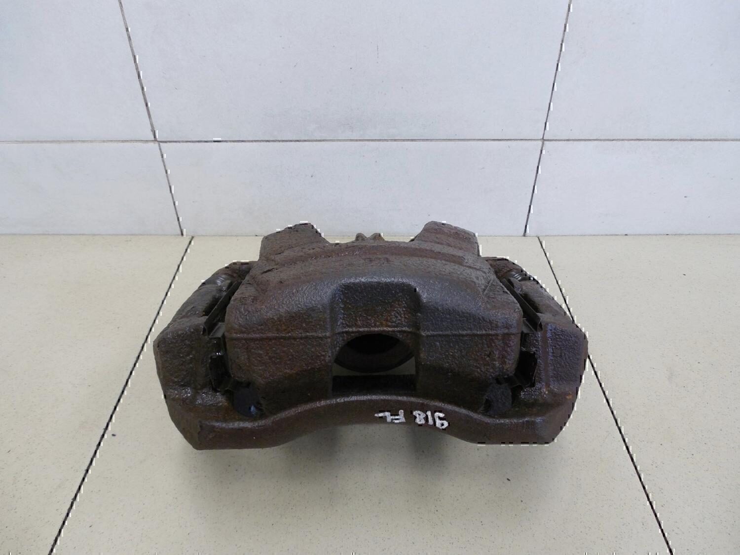 Суппорт передний левый Chevrolet Aveo (T300) 2011>