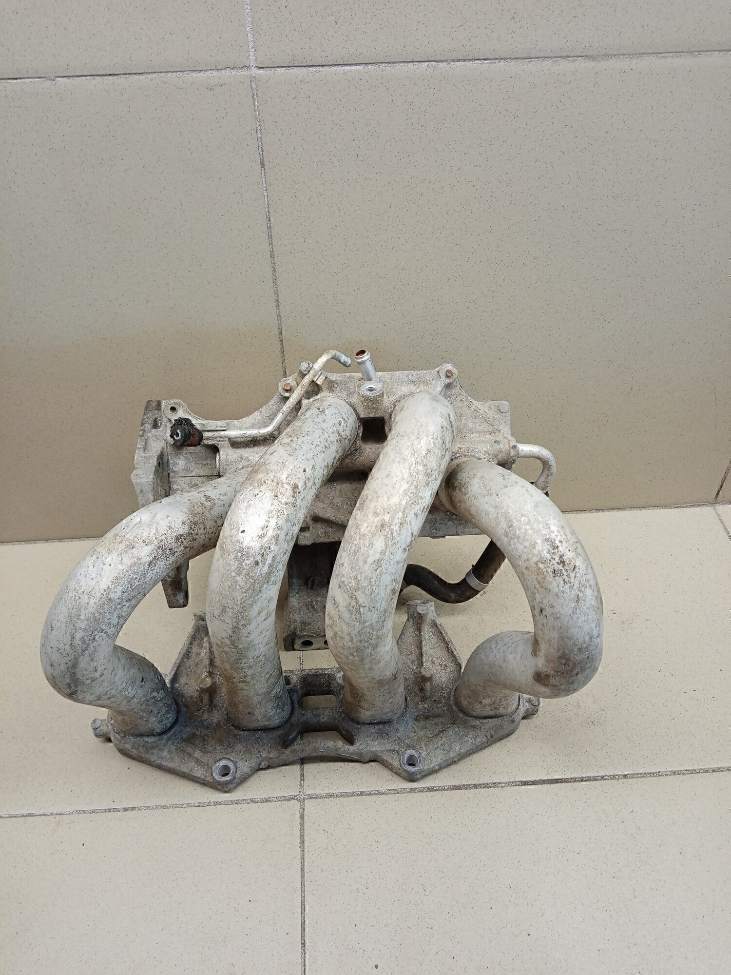 Коллектор впускной NISSAN Almera N16 2000-2006