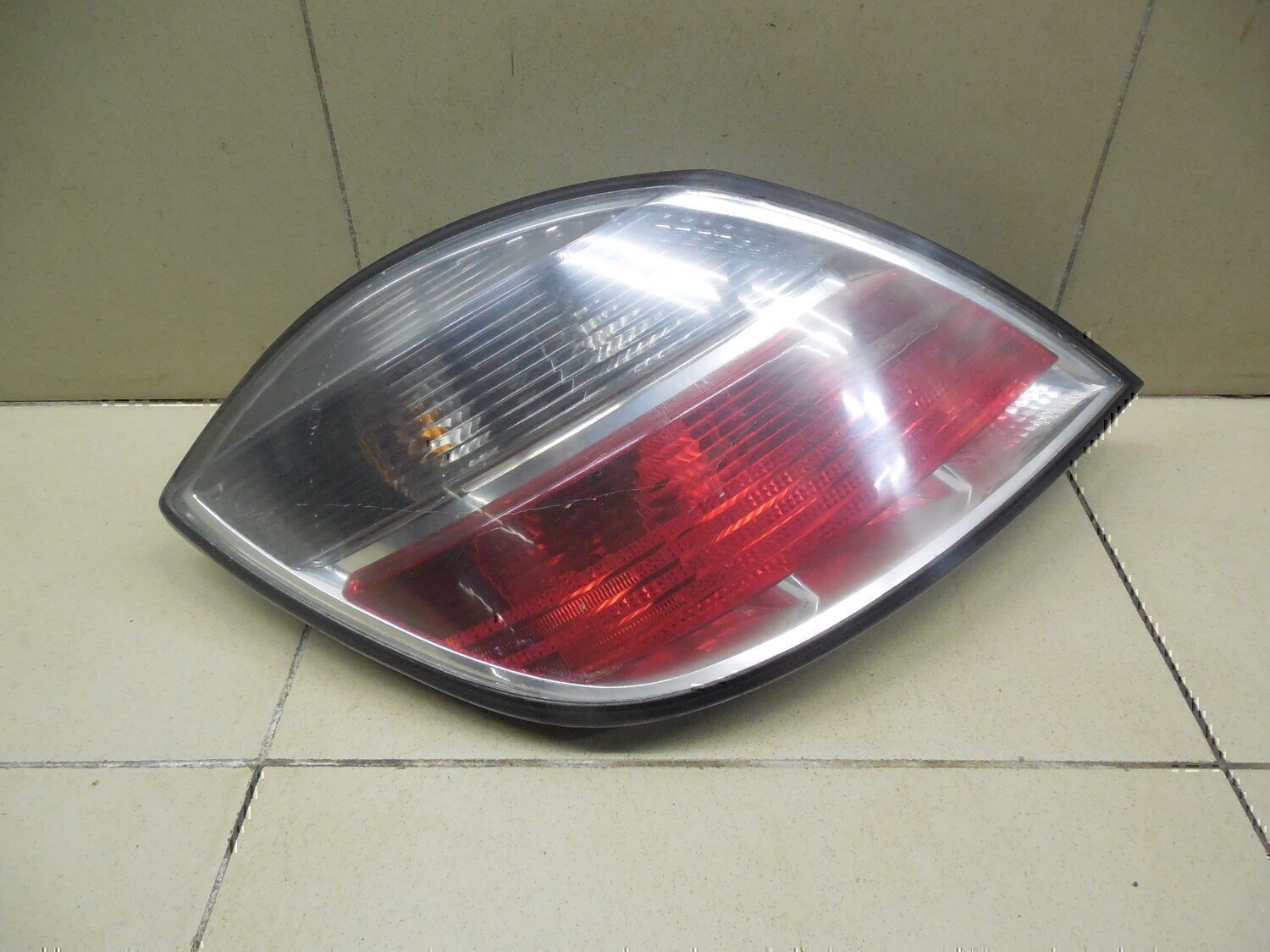 Фонарь задний левый OPEL Astra H / Family 2004-2015