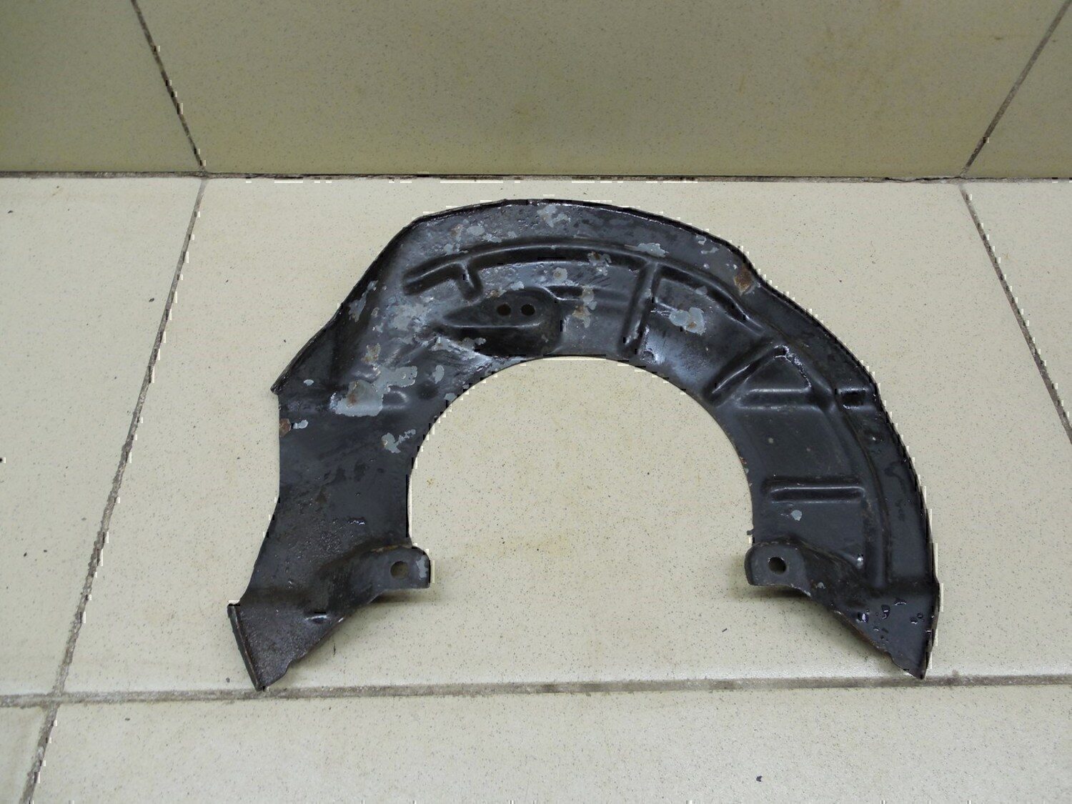 Пыльник тормозного диска Chevrolet Aveo (T300) 2011>