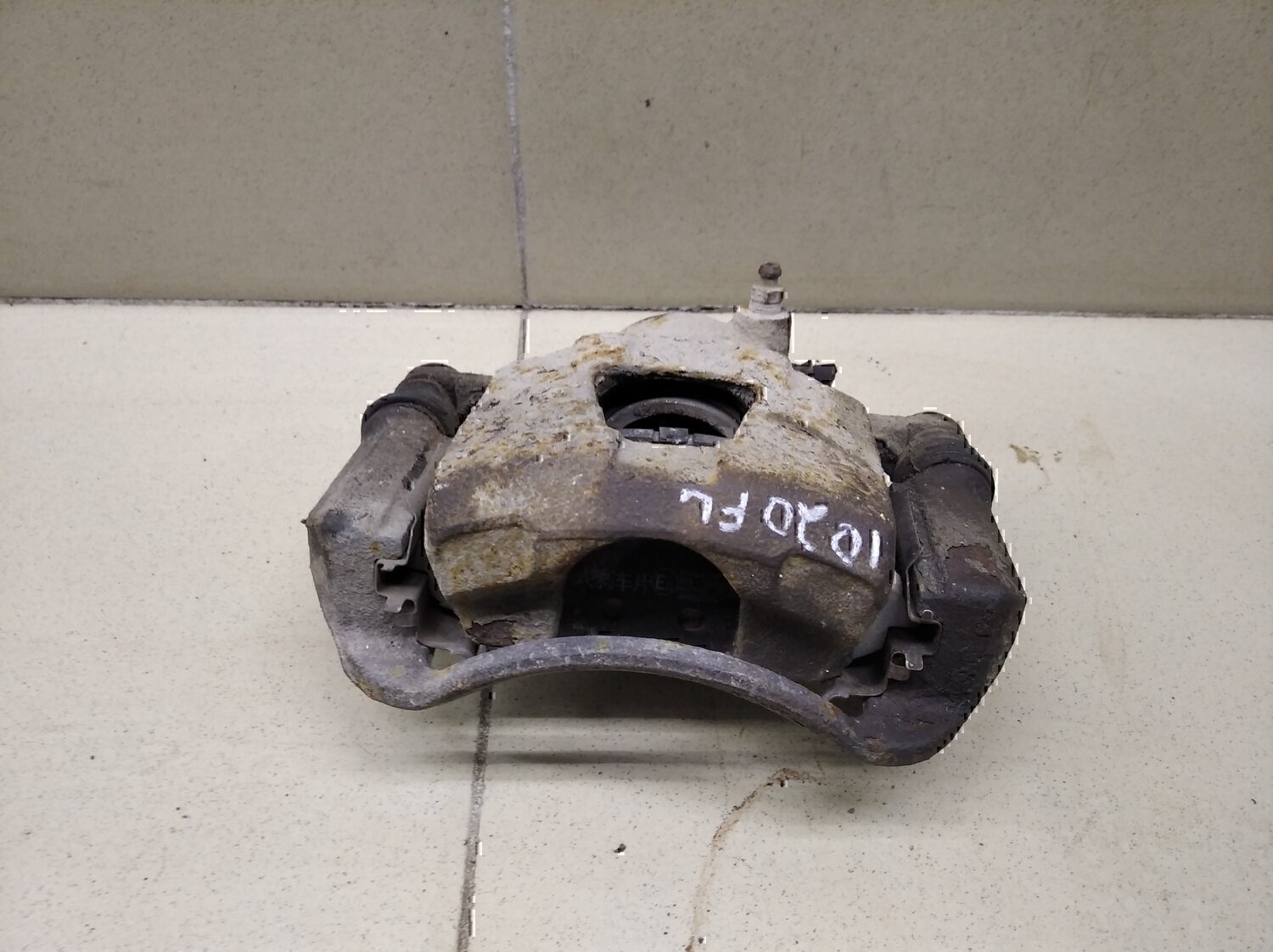 Суппорт передний левый Chevrolet Aveo (T200) 2003-2008