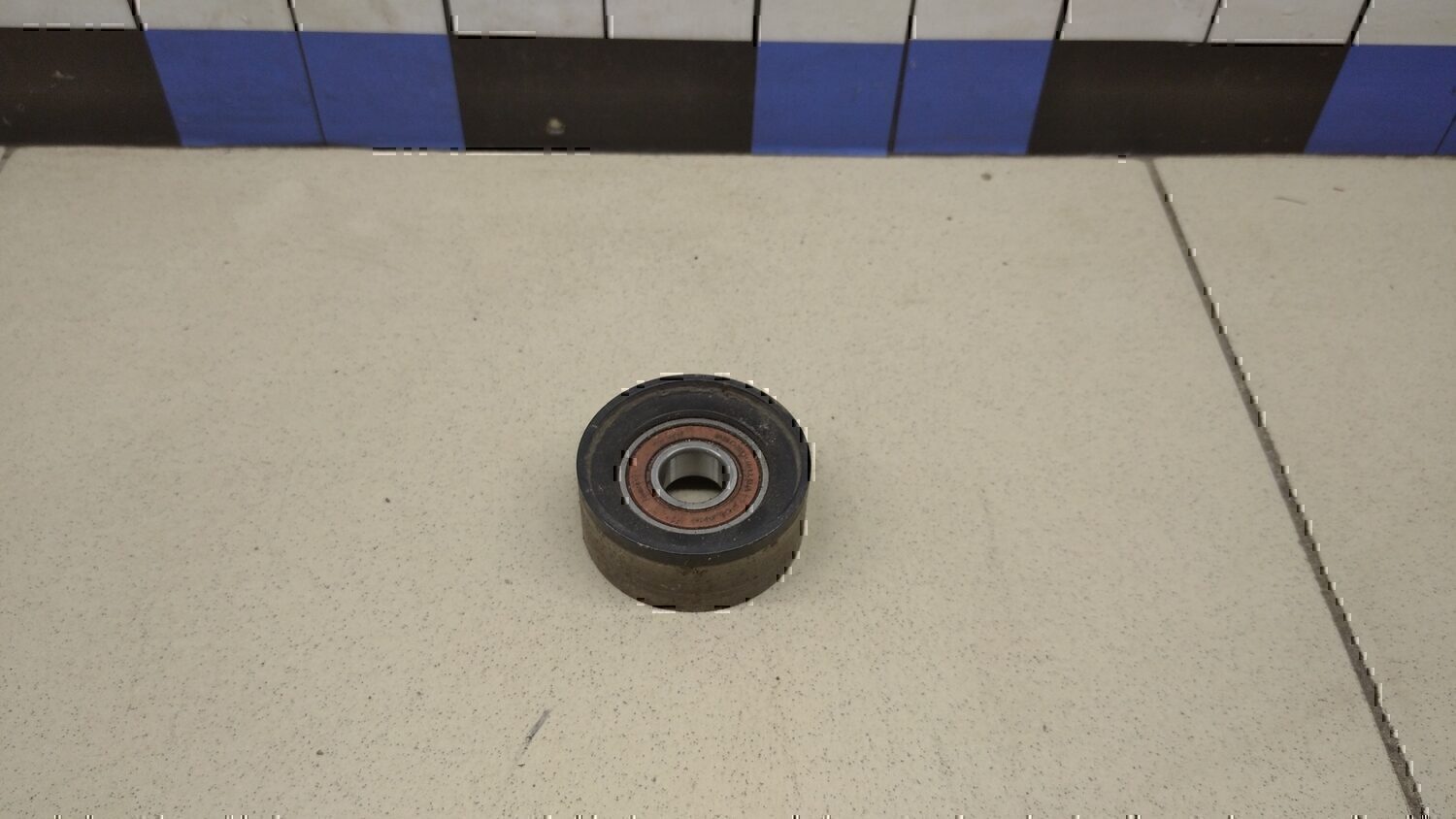 Ролик дополнительный руч. ремня RENAULT Logan 2005-2014