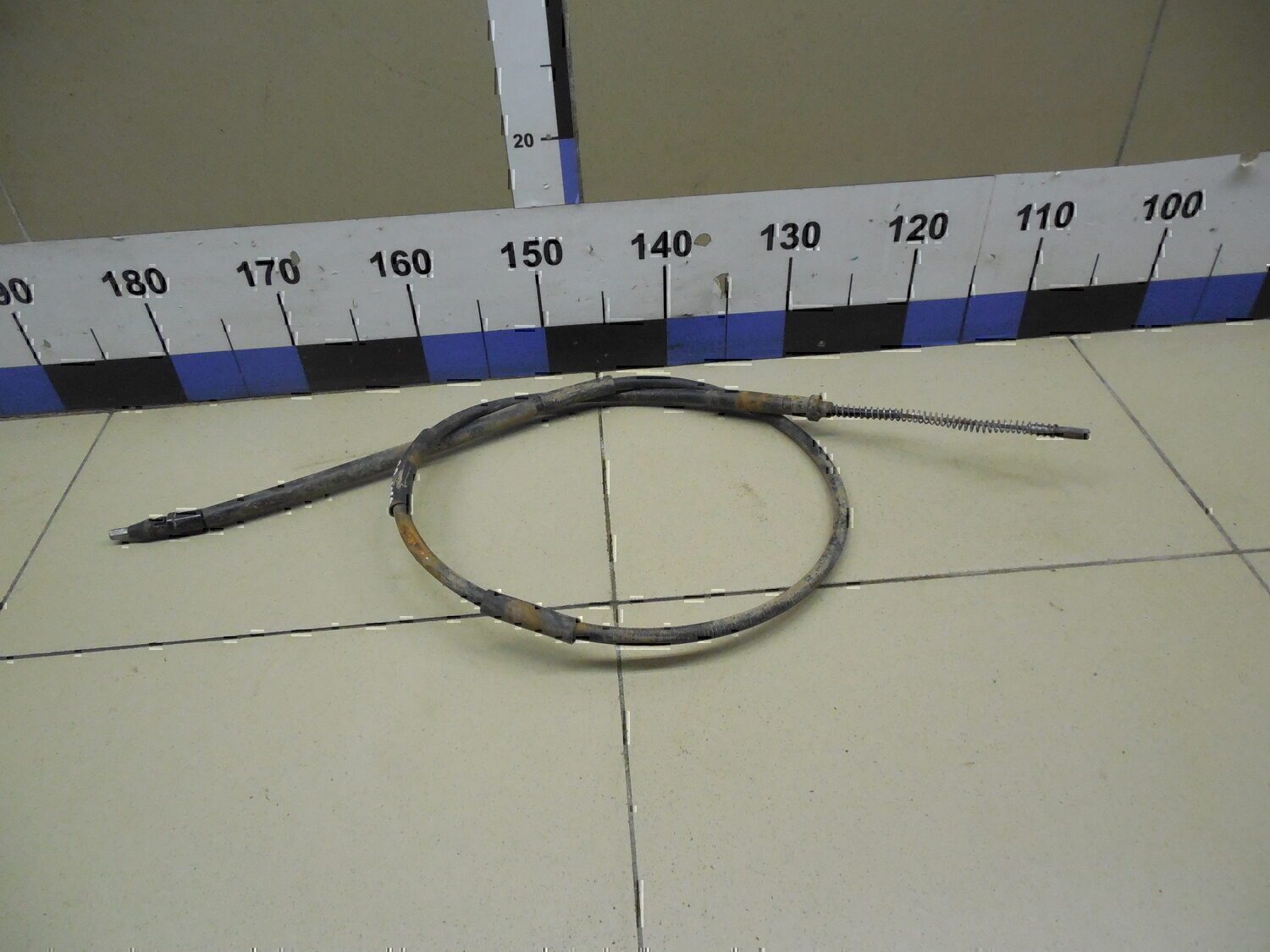 Трос стояночного тормоза VAZ Lada Granta 2011>