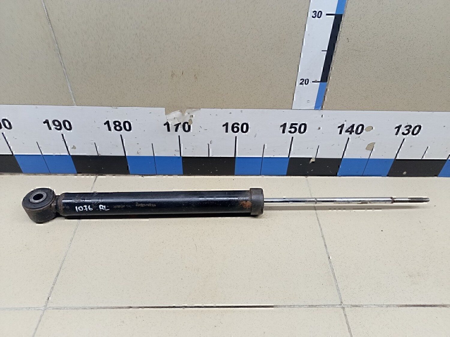 Амортизатор задний NISSAN Almera (G15) 2013>