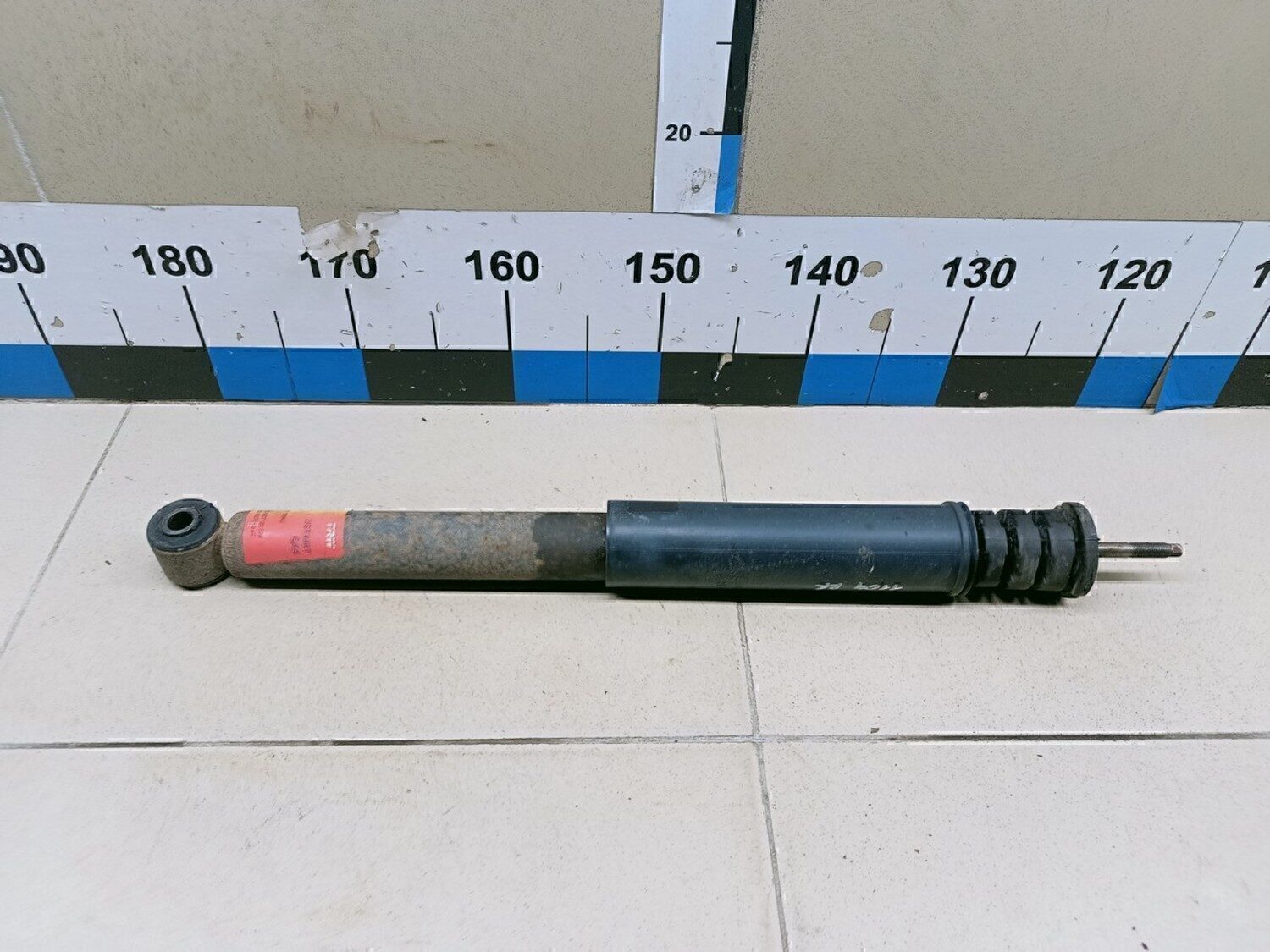 Амортизатор задний NISSAN Note (E11) 2006-2013