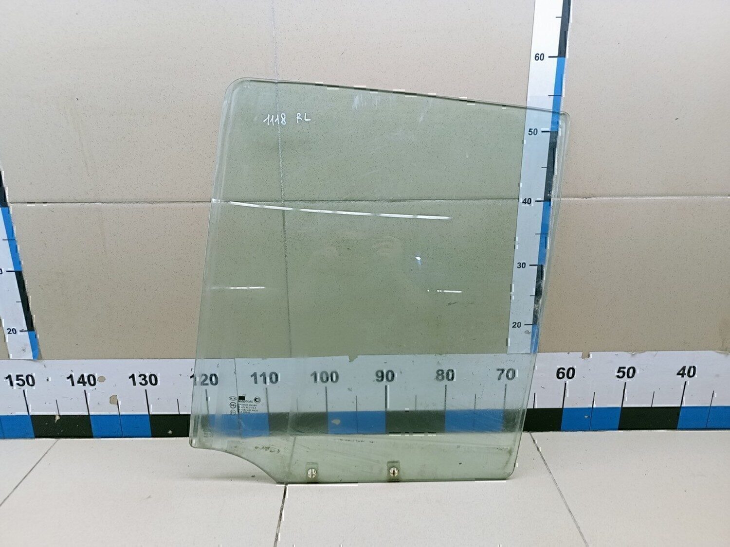 Стекло двери задней левой KIA Sportage 1994-2004