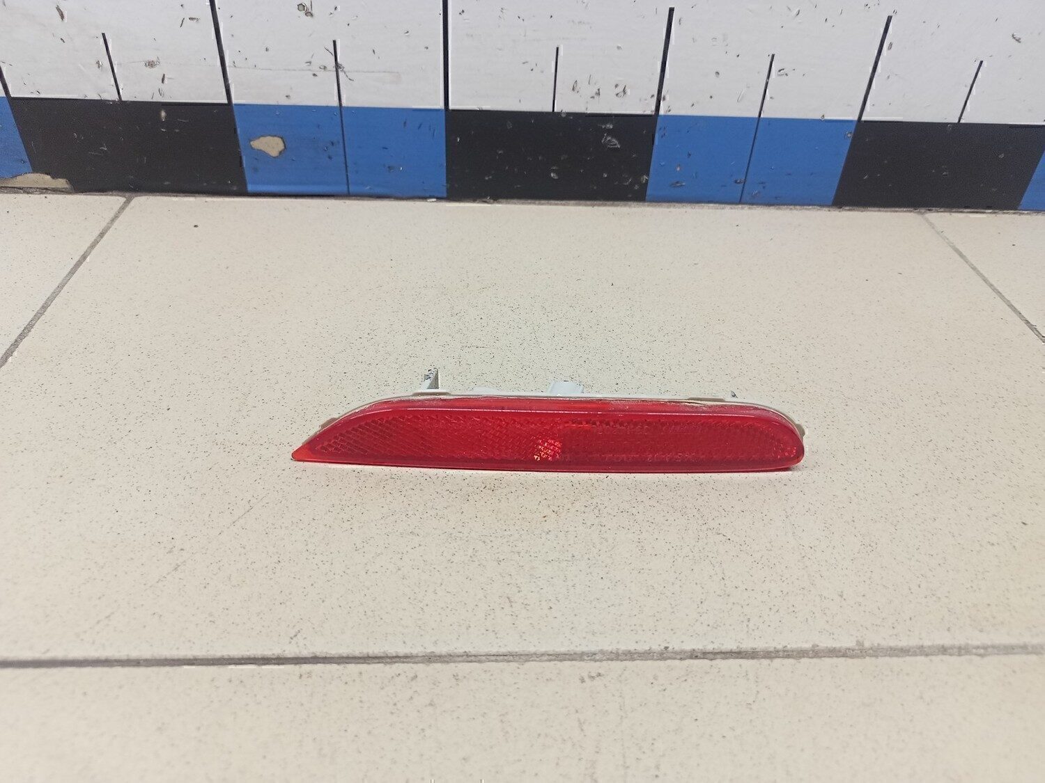 Отражатель в бампер задний левый NISSAN Qashqai (J11) 2014>