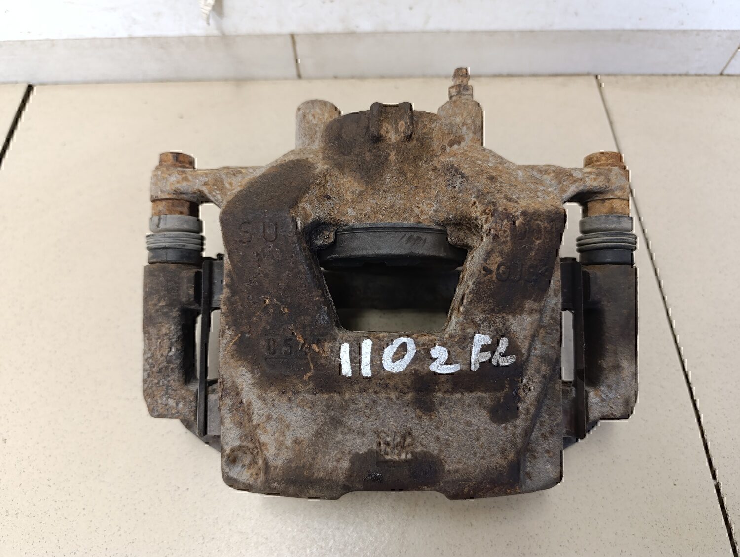 Суппорт передний левый Chevrolet Aveo (T300) 2011>