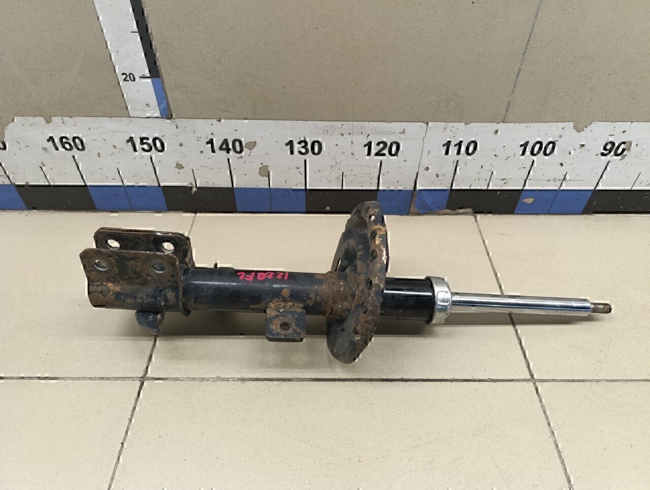 Амортизатор передний левый NISSAN Note (E11) 2006-2013