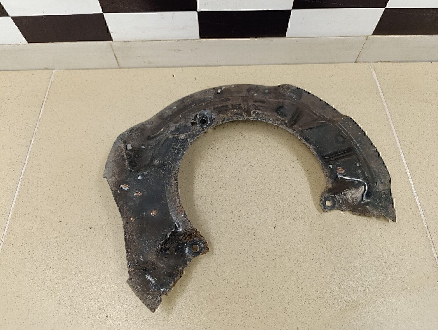 Пыльник тормозного диска Chevrolet Aveo (T300) 2011>