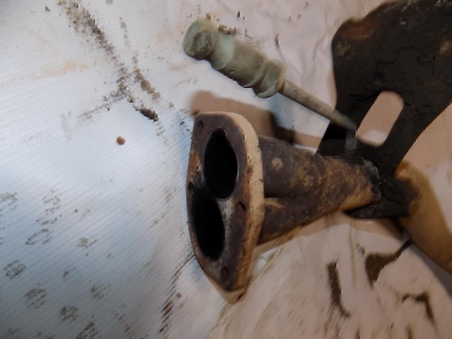 Приемная труба глушителя