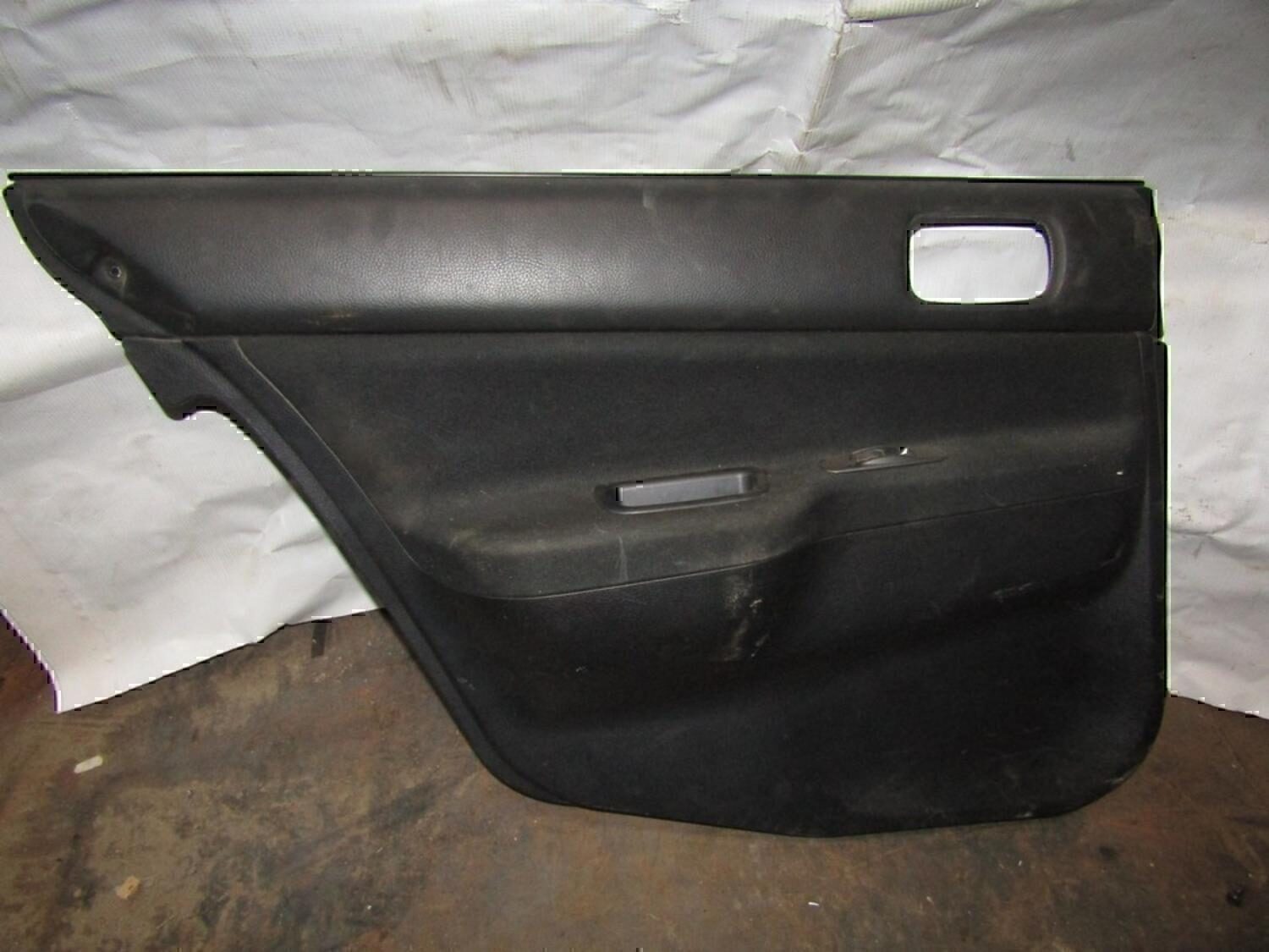 Обшивка двери задней левой MITSUBISHI Lancer (CS/Classic) 2003-2006