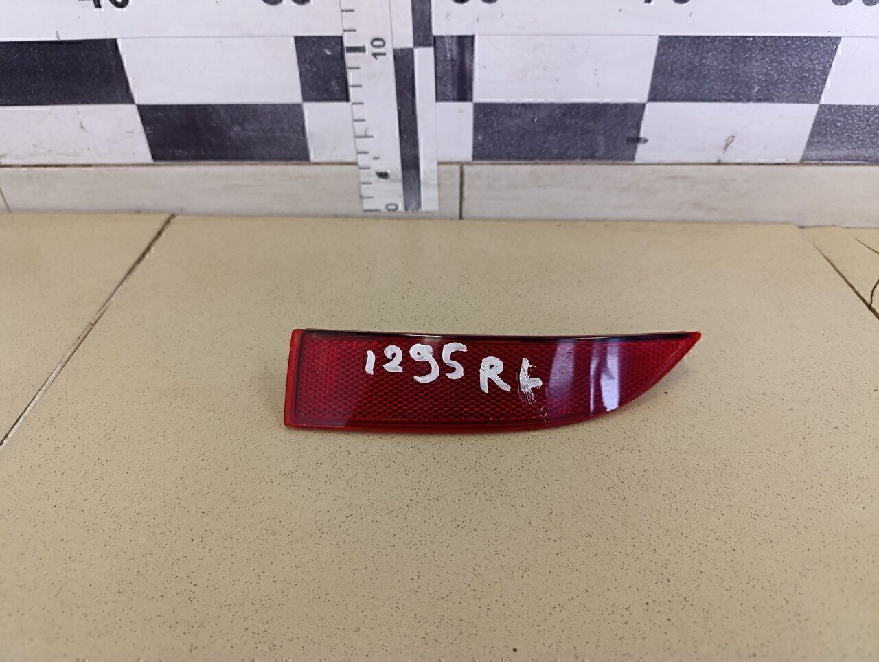 Отражатель в бампер задний левый RENAULT Logan II 2014>