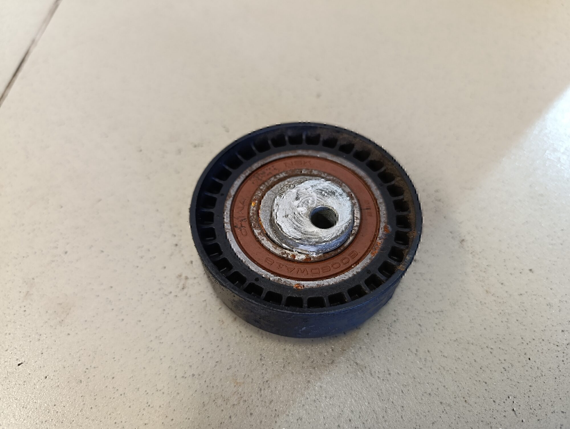 Ролик-натяжитель ремня ГРМ RENAULT Logan 2005-2014