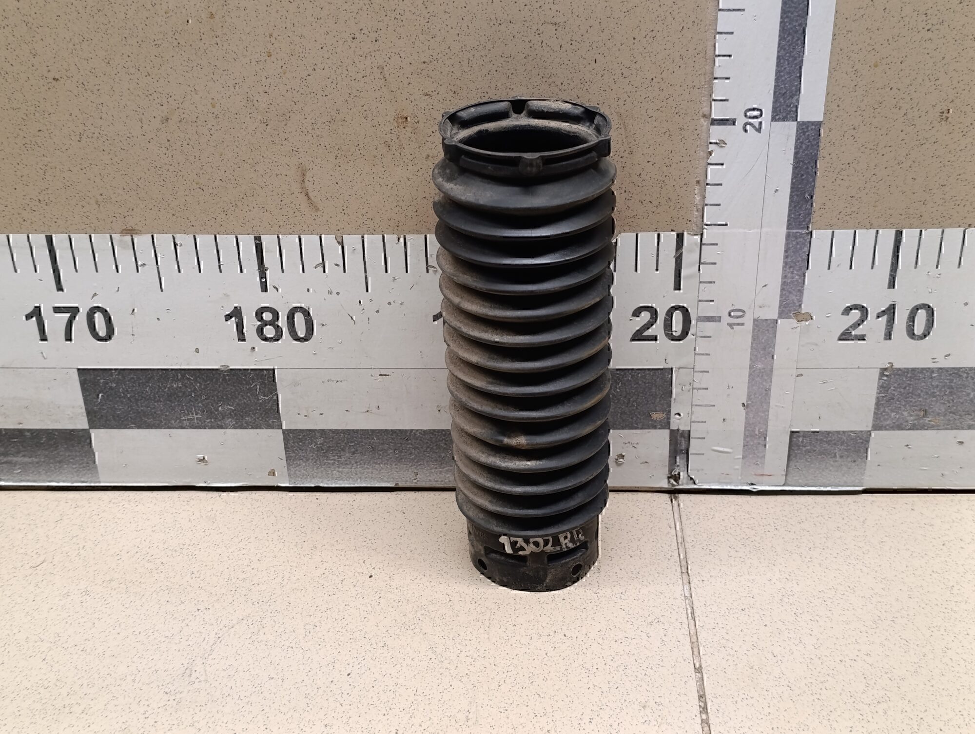 Пыльник заднего амортизатора VAZ Lada Granta 2011>