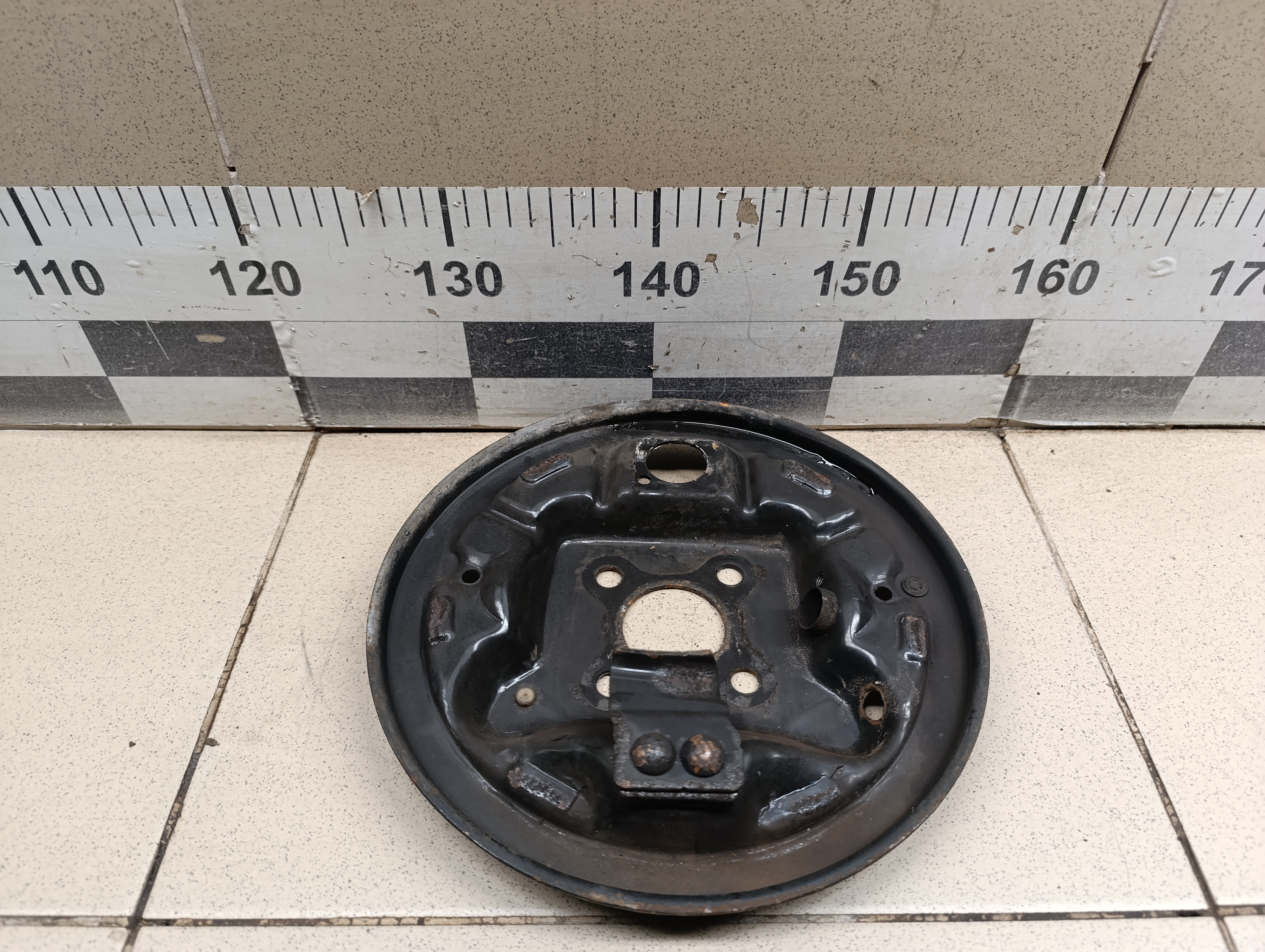 Щит опорный задний правый NISSAN Almera (G15) 2013>