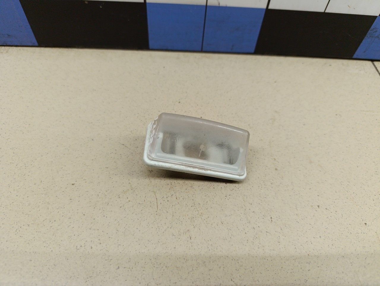 Фонарь подсветки номера TOYOTA Corolla E12 2001-2006