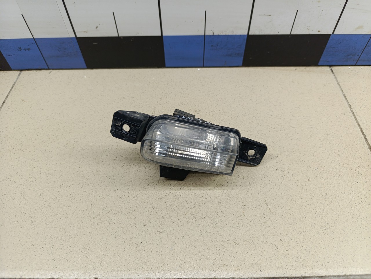 Фонарь задний в бампер левый VW Tiguan 2011-2016