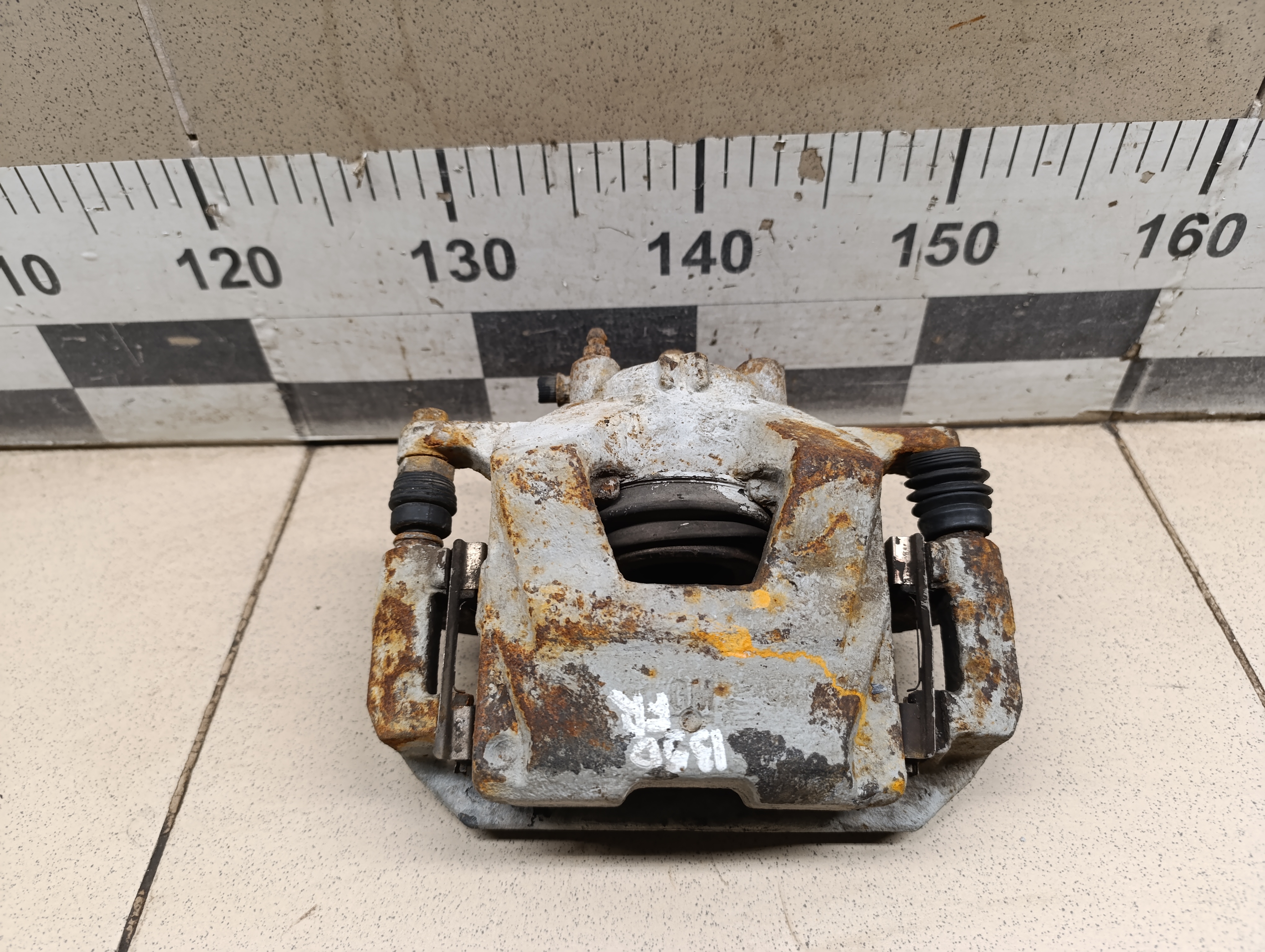 Суппорт передний правый Chevrolet Aveo (T300) 2011>