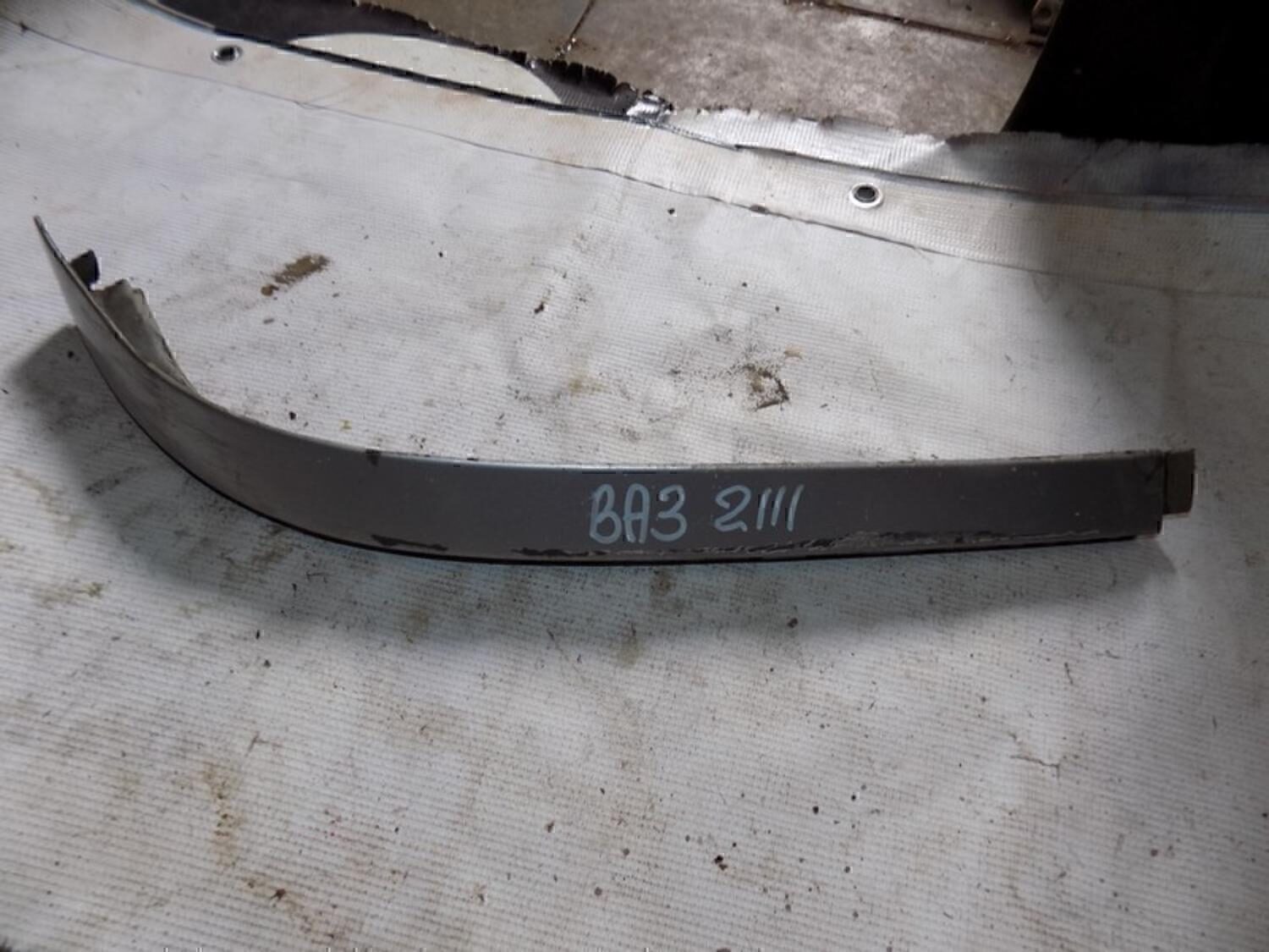 Планка под фару правая VAZ Lada 2110