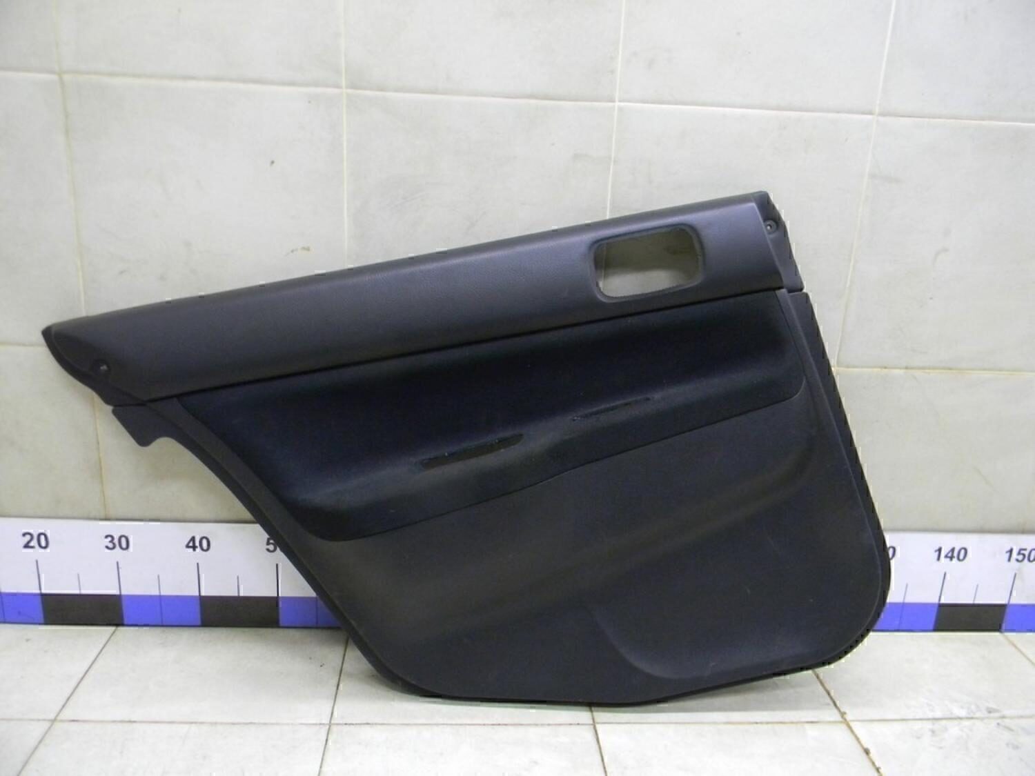 Обшивка двери задней левой MITSUBISHI Lancer (CS/Classic) 2003-2006